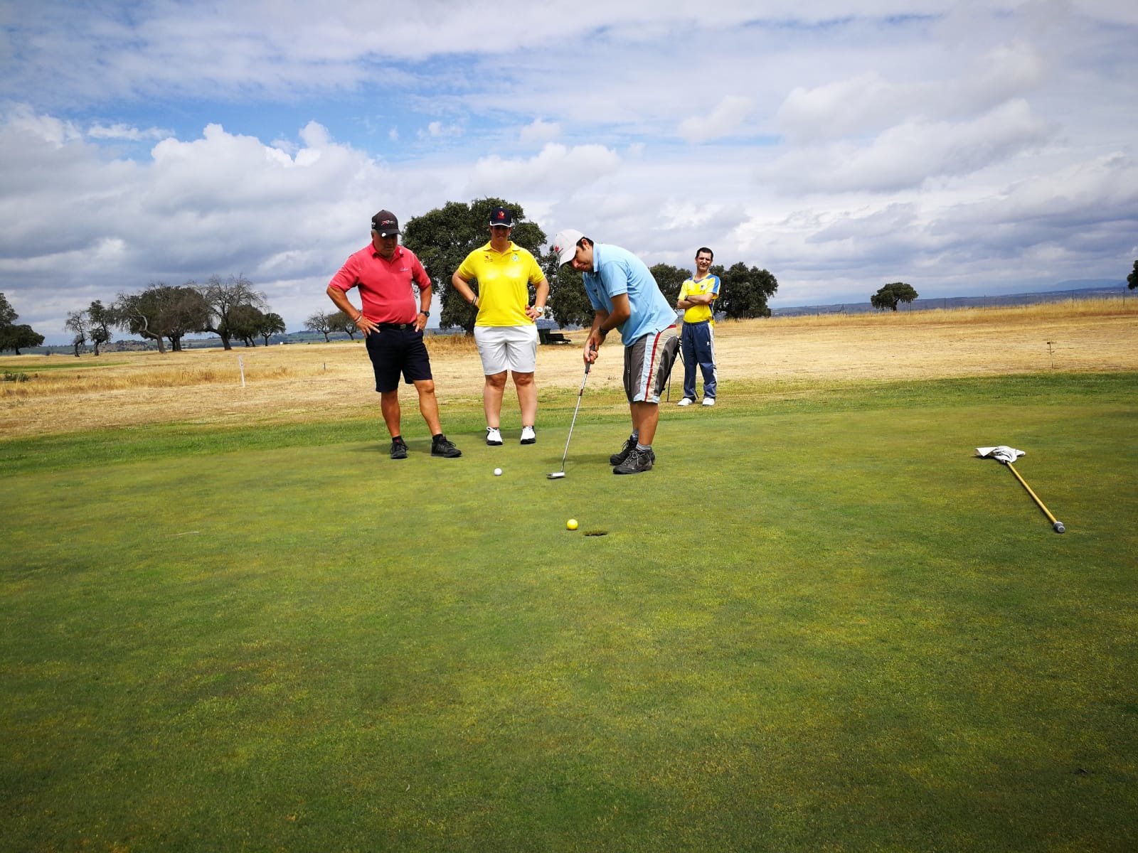Golfistas en el green de Galisteo